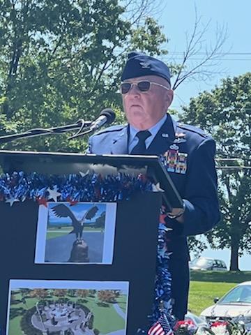 A veteran speaks at the dedication ceremony