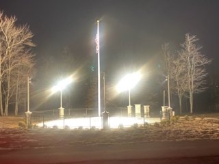 The memorial at night.
