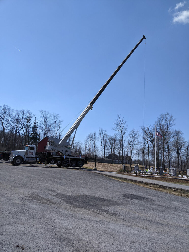 A crane is on site at the memorial