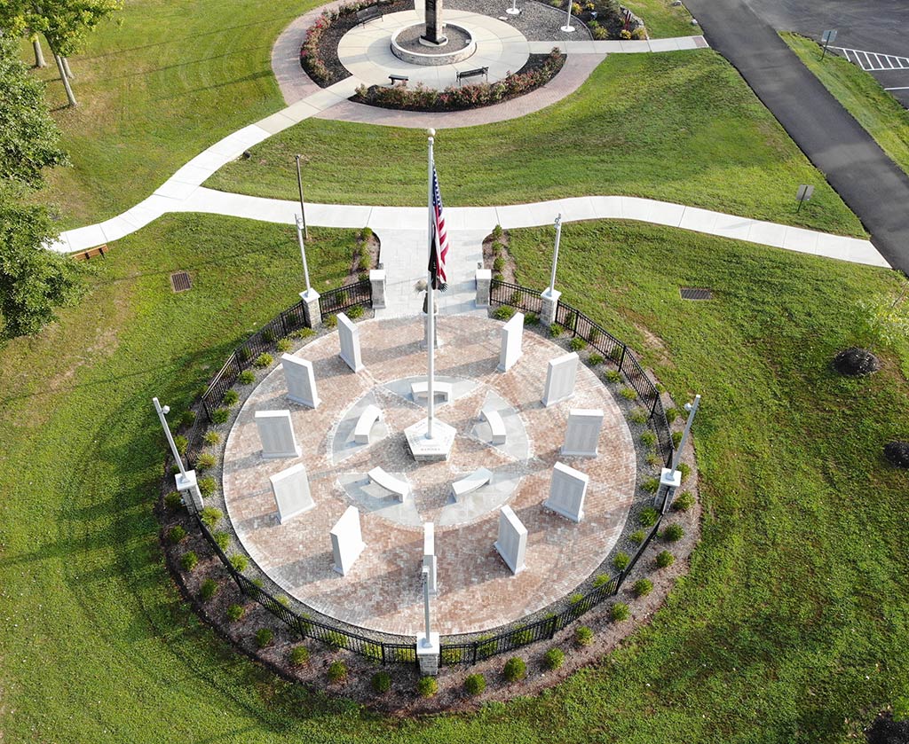 Close-up drone photo of memorial in March 2023.